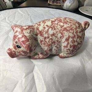 A Pig in ceramic form decorated with rose sponge splatters, A large 8" long x 4"